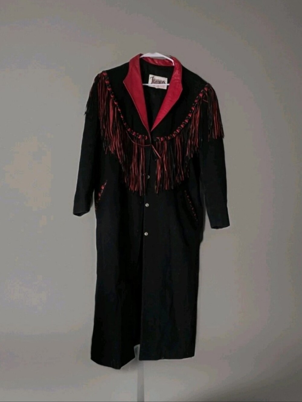 Vintage Diamond Leathers Fringe TrencBlack Leather Jacket with Red Fringe Accent